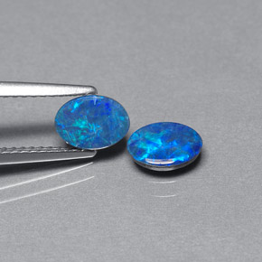 Gemas de doblete de ópalo multicolor natural de  ct, corte óvalo, opaco