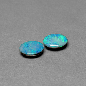 Gemas de doblete de ópalo multicolor natural de  ct, corte óvalo, opaco