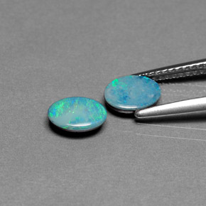 Gemas de doblete de ópalo multicolor natural de  ct, corte óvalo, opaco