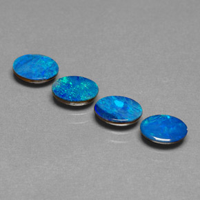 Gemas de doblete de ópalo multicolor natural de  ct, corte óvalo, opaco