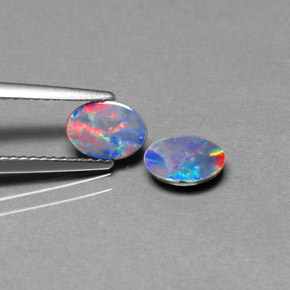 Gemas de doblete de ópalo multicolor natural de  ct, corte óvalo, opaco