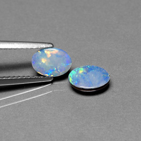 Gemas de doblete de ópalo multicolor natural de  ct, corte óvalo, opaco