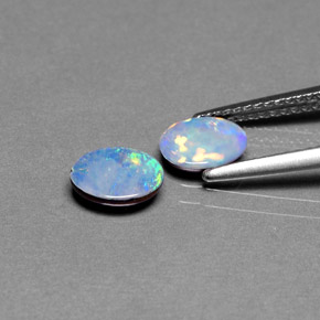Gemas de doblete de ópalo multicolor natural de  ct, corte óvalo, opaco