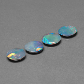 Gemas de doblete de ópalo multicolor natural de  ct, corte óvalo, opaco