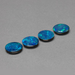 Gemas de doblete de ópalo multicolor natural de  ct, corte óvalo, opaco