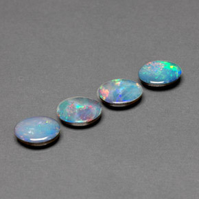 Gemas de doblete de ópalo multicolor natural de  ct, corte óvalo, opaco