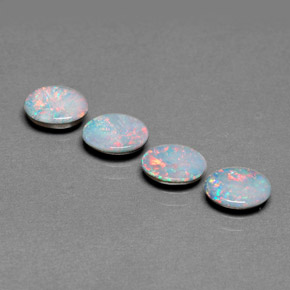Gemas de doblete de ópalo multicolor natural de  ct, corte óvalo, opaco
