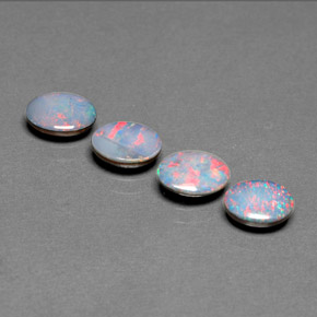 Gemas de doblete de ópalo multicolor natural de  ct, corte óvalo, opaco