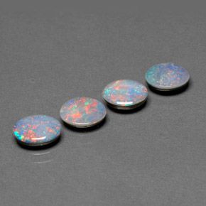 Gemas de doblete de ópalo multicolor natural de  ct, corte óvalo, opaco