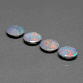 Gemas de doblete de ópalo multicolor natural de  ct, corte óvalo, opaco