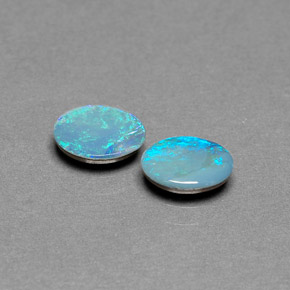 Gemas de doblete de ópalo multicolor natural de  ct, corte óvalo, opaco