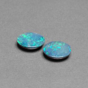 Gemas de doblete de ópalo multicolor natural de  ct, corte óvalo, opaco