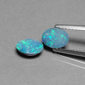 Gemas de doblete de ópalo multicolor natural de  ct, corte óvalo, opaco