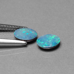 Gemas de doblete de ópalo multicolor natural de  ct, corte óvalo, opaco