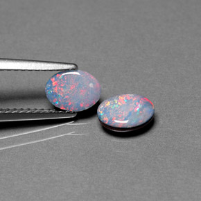 Gemas de doblete de ópalo multicolor natural de  ct, corte óvalo, opaco