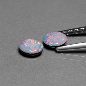 Gemas de doblete de ópalo multicolor natural de  ct, corte óvalo, opaco