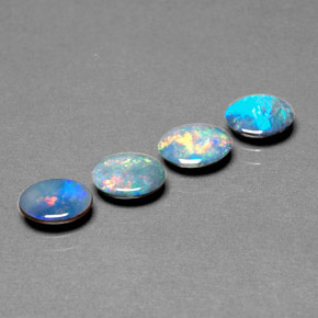 Gemas de doblete de ópalo multicolor natural de  ct, corte óvalo, opaco