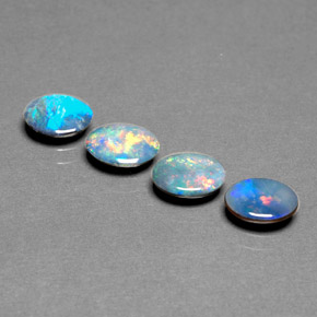 Gemas de doblete de ópalo multicolor natural de  ct, corte óvalo, opaco