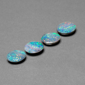 Gemas de doblete de ópalo multicolor natural de  ct, corte óvalo, opaco