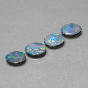 Gemas de doblete de ópalo multicolor natural de  ct, corte óvalo, opaco