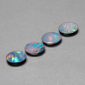 Gemas de doblete de ópalo multicolor natural de  ct, corte óvalo, opaco
