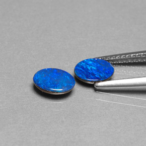 Gemas de doblete de ópalo multicolor natural de  ct, corte óvalo, opaco