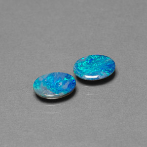 Gemas de doblete de ópalo multicolor natural de  ct, corte óvalo, opaco