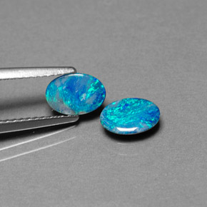 Gemas de doblete de ópalo multicolor natural de  ct, corte óvalo, opaco