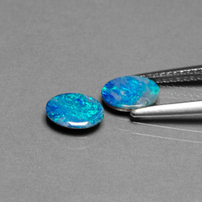 Gemas de doblete de ópalo multicolor natural de  ct, corte óvalo, opaco