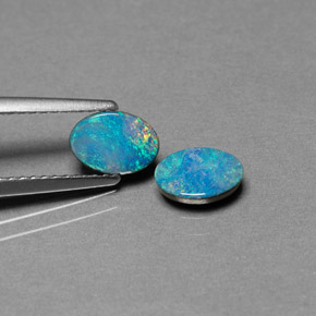 Gemas de doblete de ópalo multicolor natural de  ct, corte óvalo, opaco