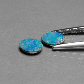 Gemas de doblete de ópalo multicolor natural de  ct, corte óvalo, opaco