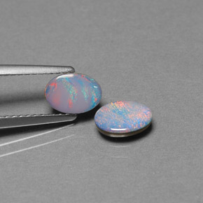 Gemas de doblete de ópalo multicolor natural de  ct, corte óvalo, opaco
