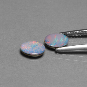 Gemas de doblete de ópalo multicolor natural de  ct, corte óvalo, opaco