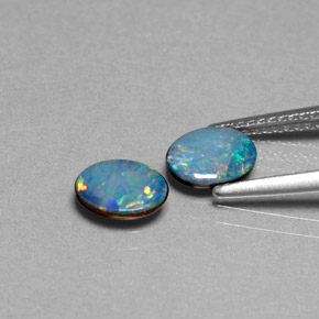 Gemas de doblete de ópalo multicolor natural de  ct, corte óvalo, opaco