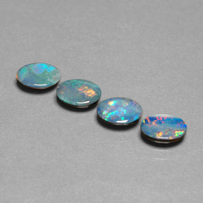 Gemas de doblete de ópalo multicolor natural de  ct, corte óvalo, opaco