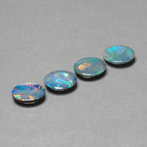 Gemas de doblete de ópalo multicolor natural de  ct, corte óvalo, opaco