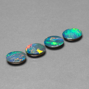 Gemas de doblete de ópalo multicolor natural de  ct, corte óvalo, opaco
