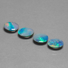Gemas de doblete de ópalo multicolor natural de  ct, corte óvalo, opaco