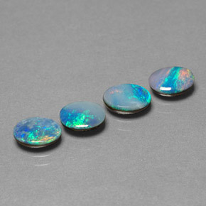 Gemas de doblete de ópalo multicolor natural de  ct, corte óvalo, opaco