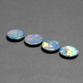 Gemas de doblete de ópalo multicolor natural de  ct, corte óvalo, opaco