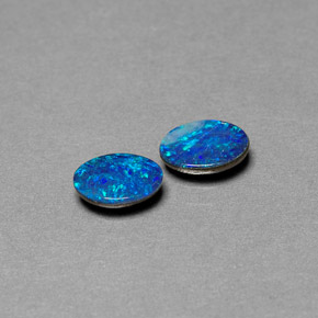 Gemas de doblete de ópalo multicolor natural de  ct, corte óvalo, opaco