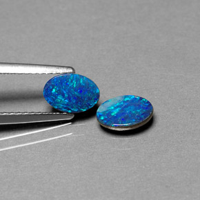 Gemas de doblete de ópalo multicolor natural de  ct, corte óvalo, opaco
