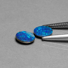 Gemas de doblete de ópalo multicolor natural de  ct, corte óvalo, opaco
