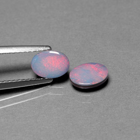 Gemas de doblete de ópalo multicolor natural de  ct, corte óvalo, opaco
