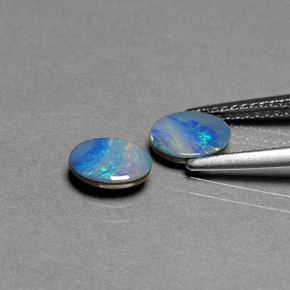Gemas de doblete de ópalo multicolor natural de  ct, corte óvalo, opaco
