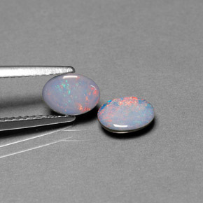 Gemas de doblete de ópalo multicolor natural de  ct, corte óvalo, opaco