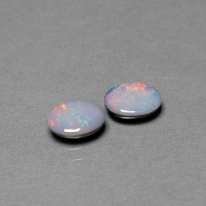 Gemas de doblete de ópalo multicolor natural de  ct, corte óvalo, opaco