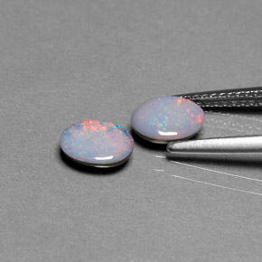 Gemas de doblete de ópalo multicolor natural de  ct, corte óvalo, opaco
