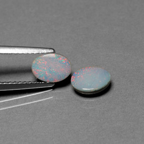 Gemas de doblete de ópalo multicolor natural de  ct, corte óvalo, opaco