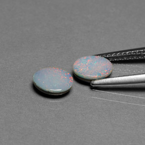 Gemas de doblete de ópalo multicolor natural de  ct, corte óvalo, opaco